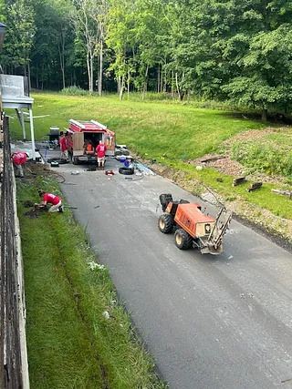  AMB Lawnsoakers crew working