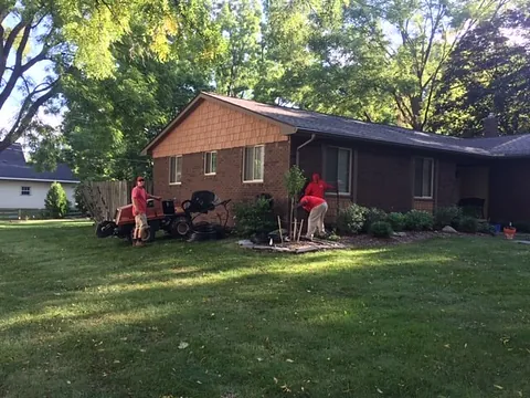 AMB Lawnsoakers crew working on a lawn